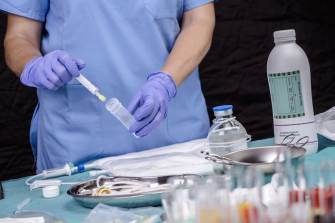 nurse preparing medication